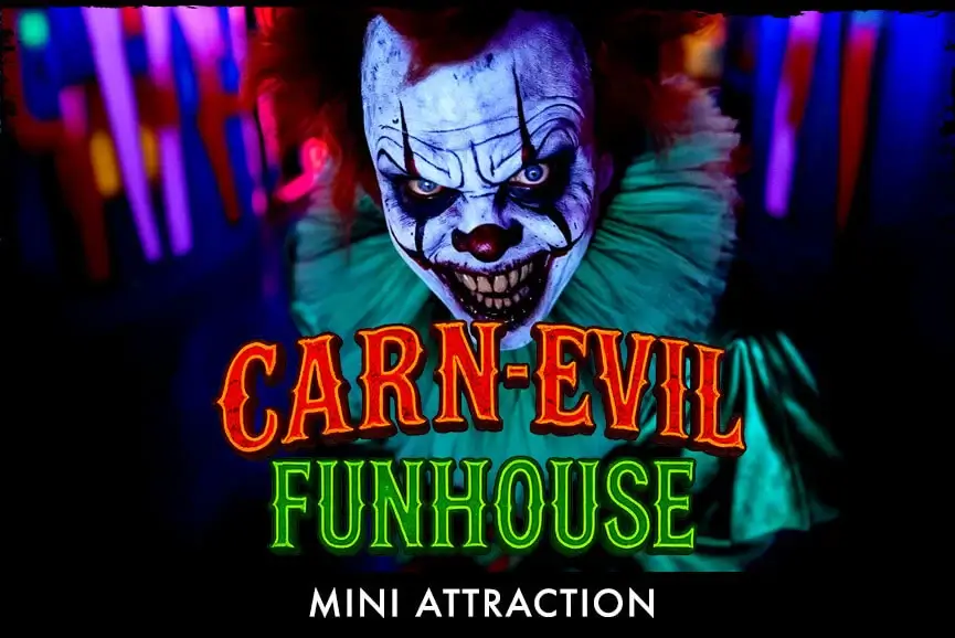 sinister clown in UV‑lit Carn‑Evil Funhouse at Scaregrounds PDX, Portland OR