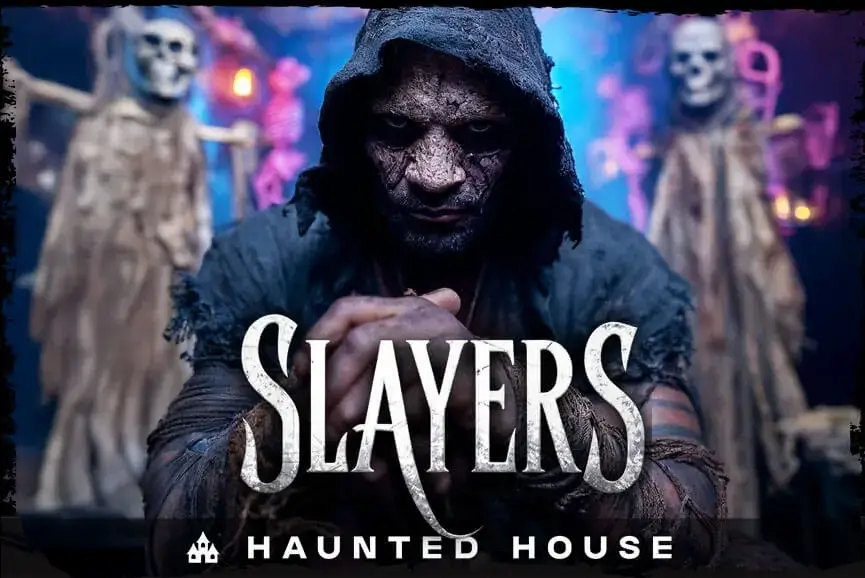 hooded creature glaring in Slayers haunted house at Scaregrounds PDX, Portland OR